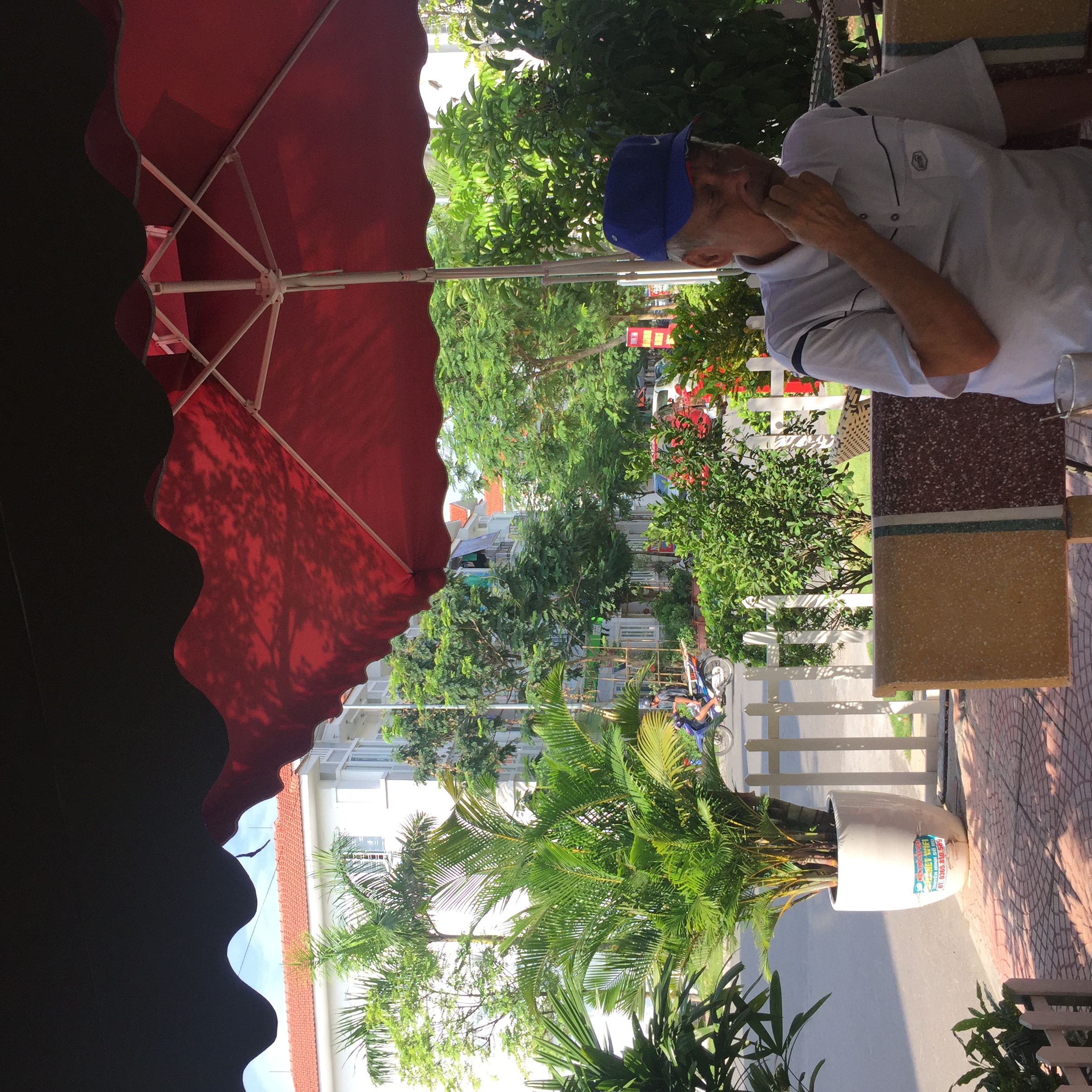 Dad at cafe in our old neighbourhood, 2019